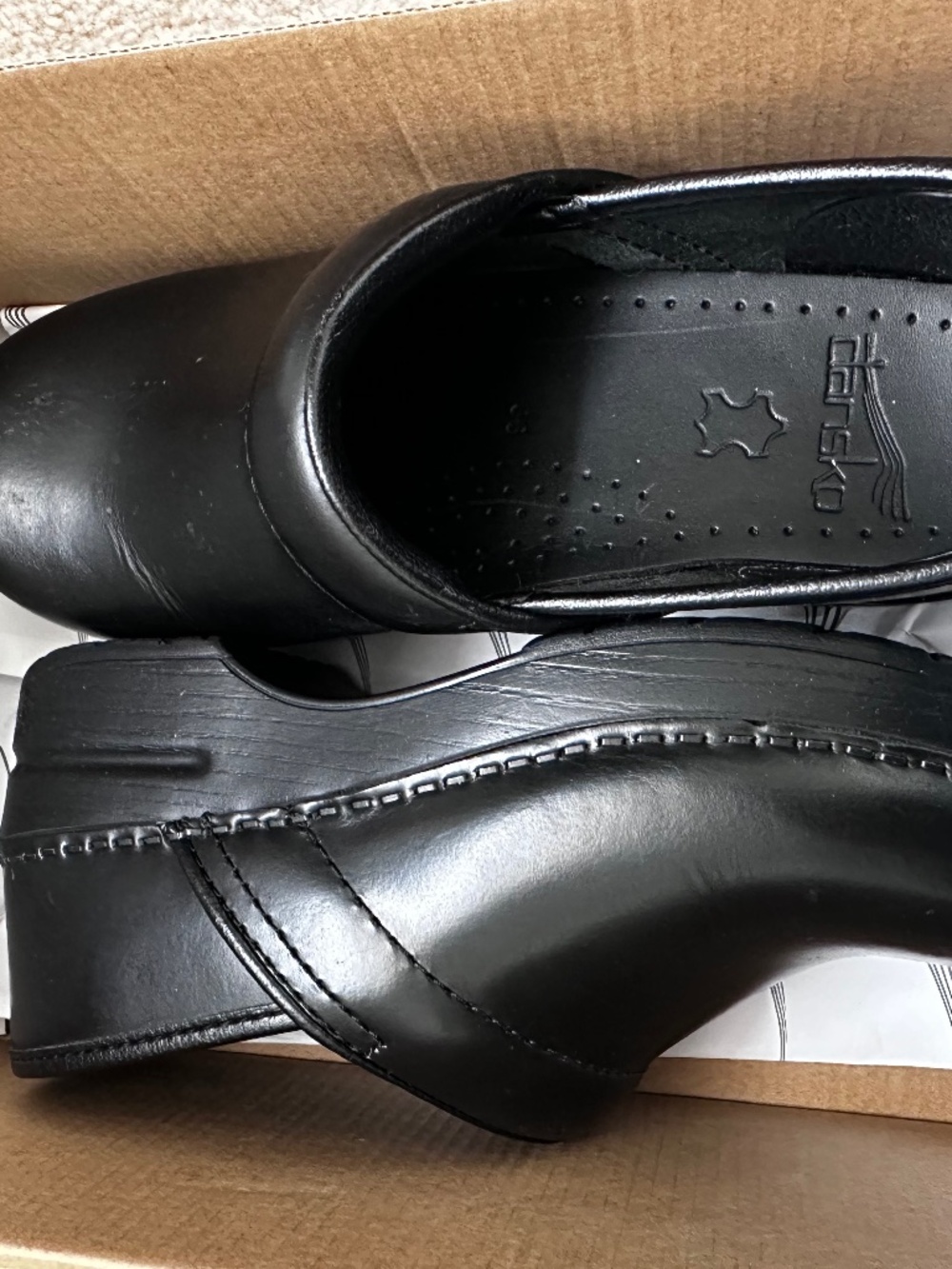Dansko black leather clog